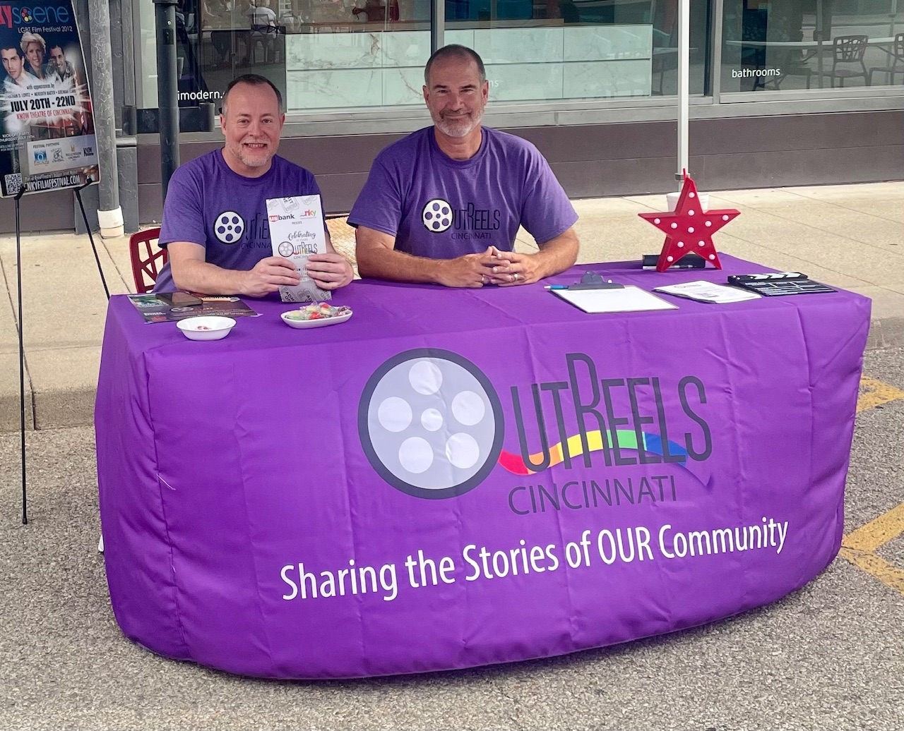 Chuck Beatty and David Wolff sit together at an OutReels Cincinnati event.