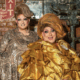 Drag performers Penny Tration, left, and Molly Mormen, right, pose together inside Rosie’s Tavern in Covington, Kentucky.