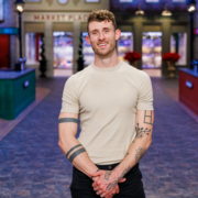 Holiday Baking Championship competitor Chase Maus Chase Maus, a Kentucky pastry chef and Season 12 contestant on Food Network’s Holiday Baking Championship, smiles on the show’s holiday themed kitchen set.