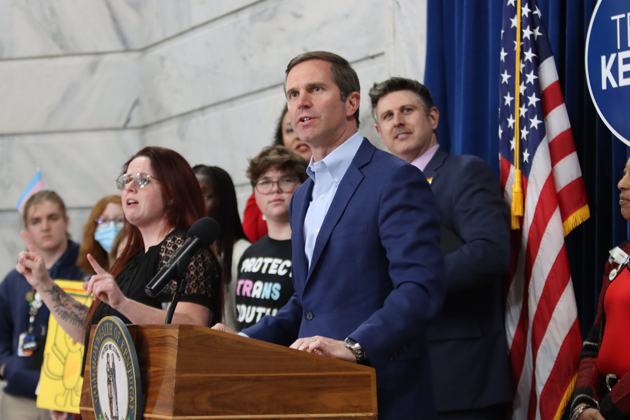 Gov. Andy Beshear and Fairness Campaign Executive Director Chris Hartman speak at an LGBTQ rights rally during Kentucky’s General Assembly in Frankfort. 2026 Legislative session starts tomorrow.