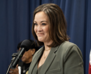 Kentucky Lt. Gov. Jacqueline Coleman speaks at a podium at the 2026 Fairness Rally at the Kentucky State Capitol